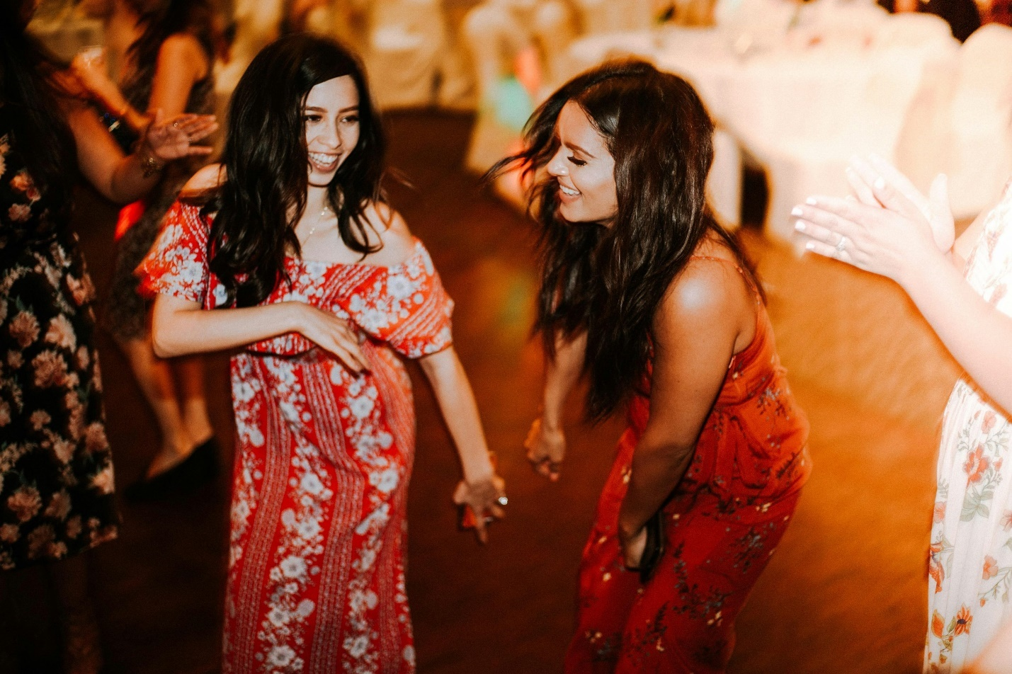 Friends dancing at a prom event