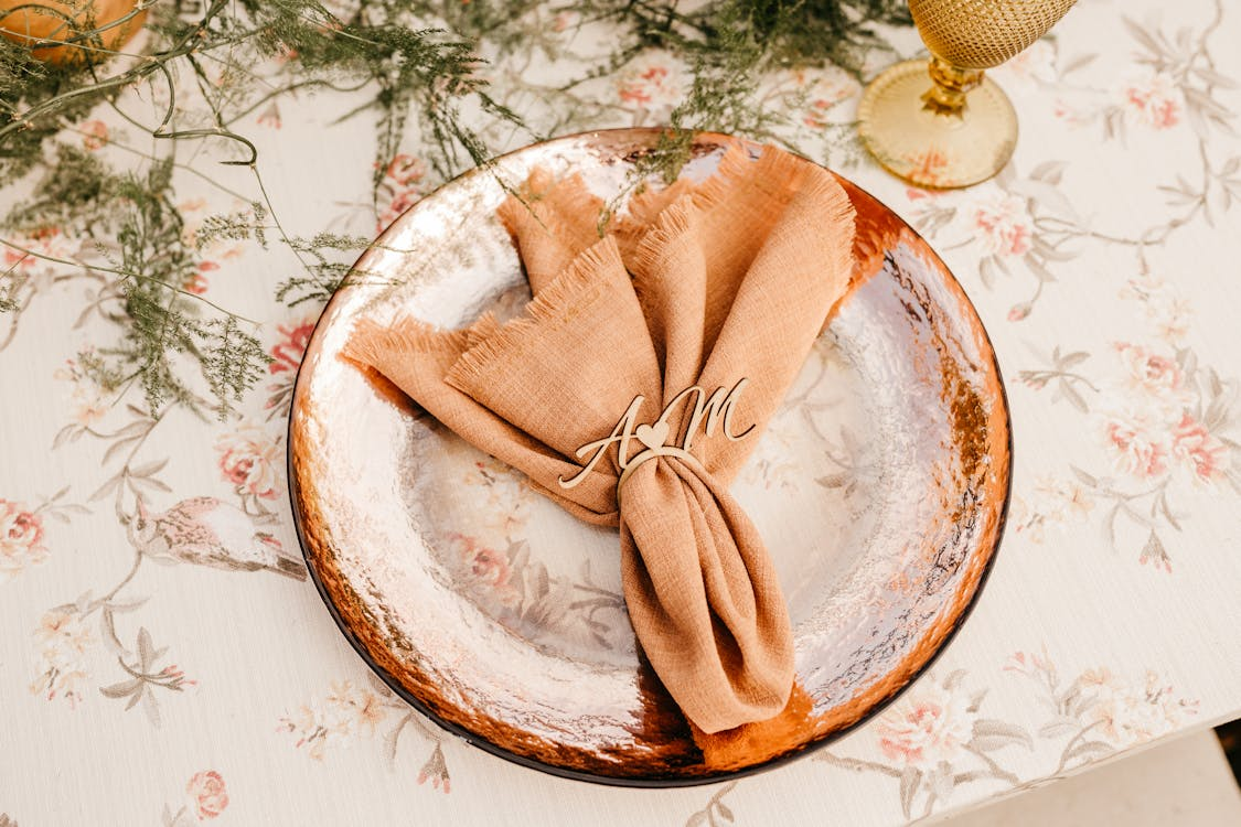 Elegant table setting with a personalized monogram napkin
