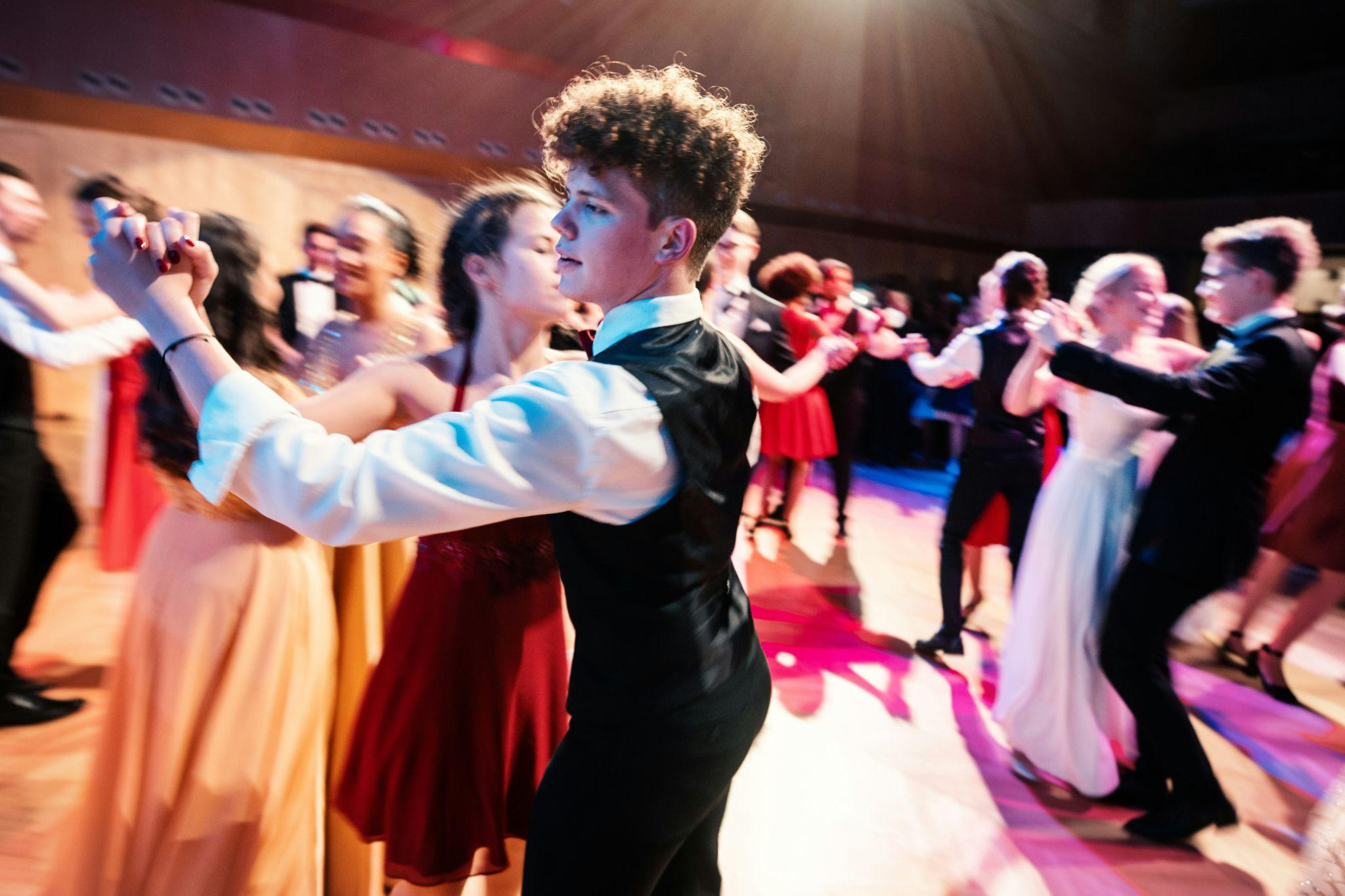 students dancing at a school event