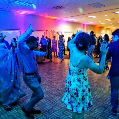 A photo showing people dancing at an event